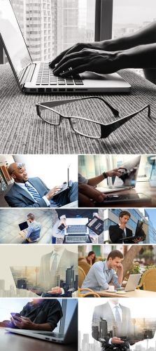 Stock+Image+City+and+businessman+using+laptop+computer