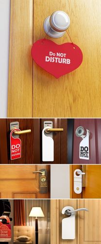 Stock+Image+Hotel+handles+with+hanging+signs_1