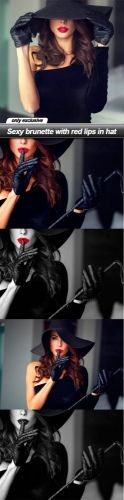 Sexy brunette with red lips in hat