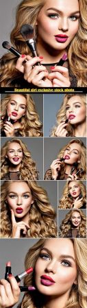 Attractive fashion model with long curly hair and fashion makeup