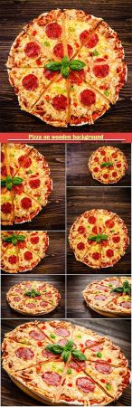 Pizza on wooden background