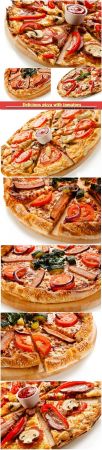 Delicious pizza with tomatoes, peppers and mushrooms