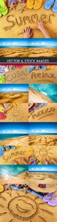 Summer beach and hilarious sun drawn on sand