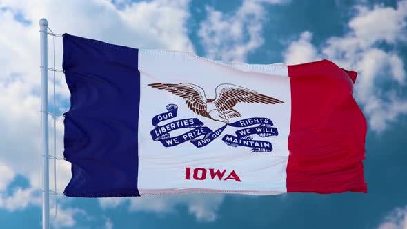 Videohive - Iowa Flag on a Flagpole Waving in the Wind in the Sky - 36375224