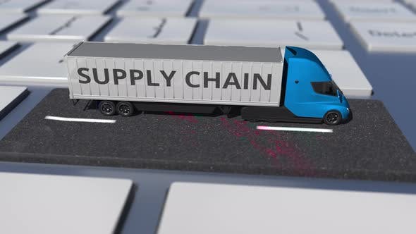 Videohive - Truck with SUPPLY CHAIN Text on the Computer Keyboard - 36407048
